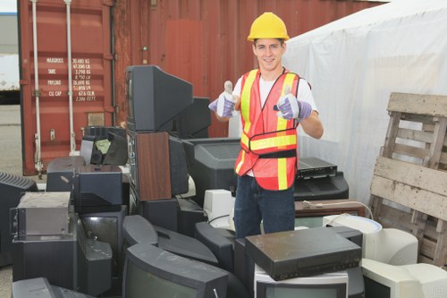 Leyton garden clearance crew loading green waste into a van